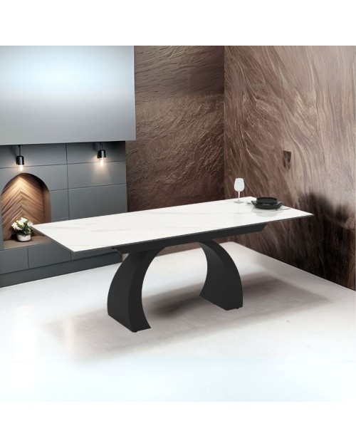 Tavolo allungabile Libra con piano in ceramica effetto marmo bianco e base arcuata nera 140x80x76H