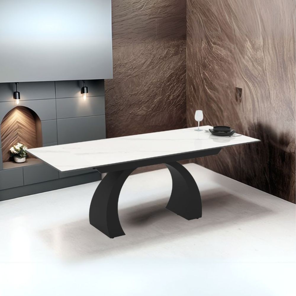 Tavolo allungabile Libra con piano in ceramica effetto marmo bianco e base arcuata nera 140x80x76H