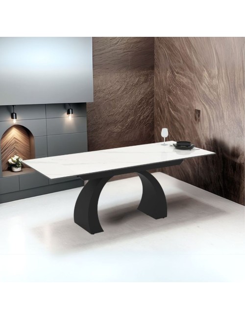 Tavolo allungabile Libra con piano in ceramica effetto marmo bianco e base arcuata nera 140x80x76H