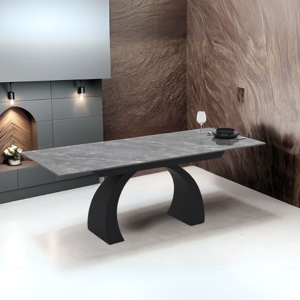 Tavolo allungabile Libra con piano in ceramica effetto marmo grigio e base arcuata nera 140x80x76H