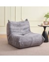 Poltrona in morbida schiuma e rivestita in tessuto grigio chiaro Horace – Comfort e relax in ogni ambiente