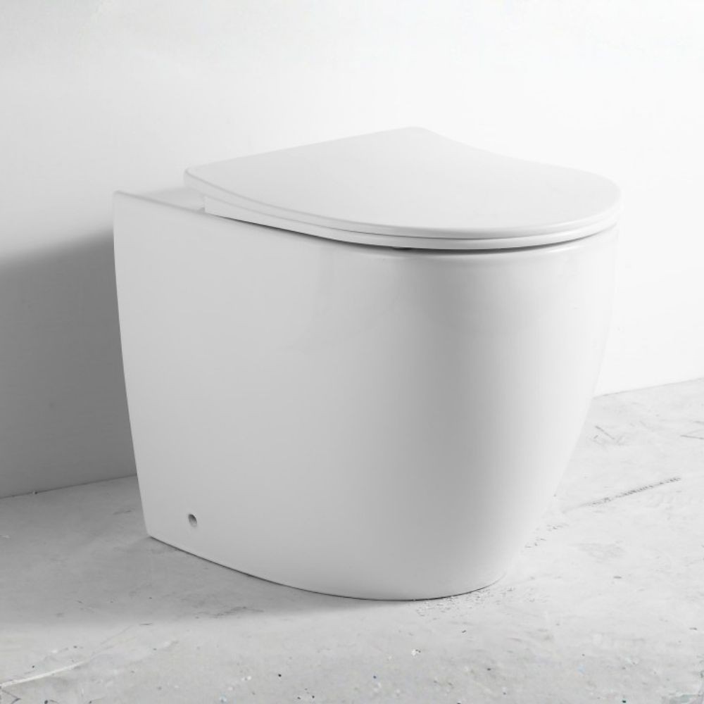 WC a pavimento bianco lucido filo muro scarico a parete FT53A