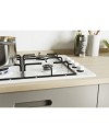 Piano cottura a gas Candy CHW6LBB 4 zone manopole laterali bianco