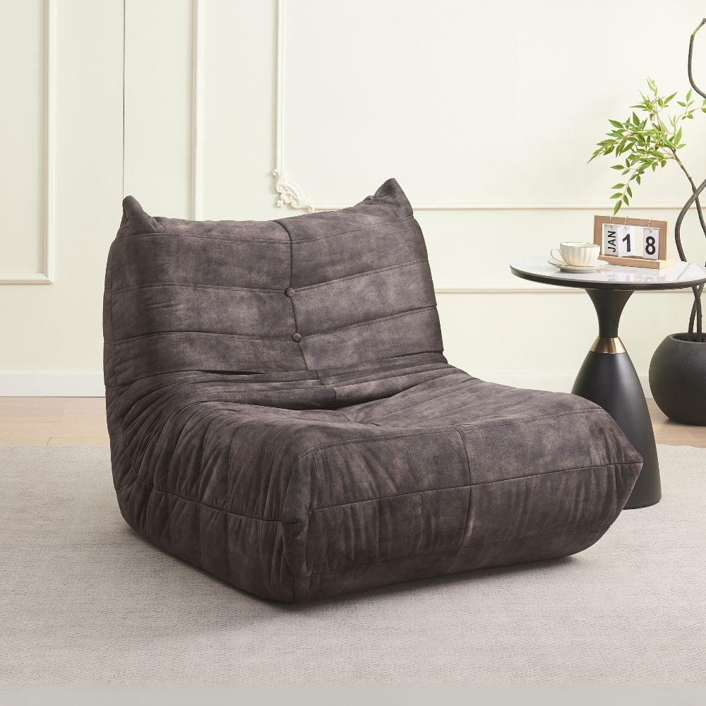 Poltrona in morbida schiuma e rivestita in tessuto grigio scuro Horace – Comfort e relax in ogni ambiente